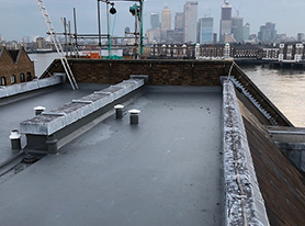 Asphalt roof with Solar Reflective coating