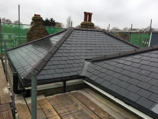 New Natural slate roof installed on a small residential block in Hampton Hill