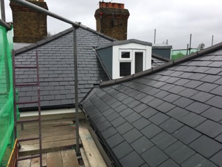 New Natural slate roof installed on a small residential block in Hampton Hill